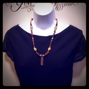 Handmade women's necklace with resin pendant